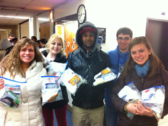 The students, of their own accord, packed blessing bags at IWU before coming to NYC to give out to the homeless during ministry.  These bags had tolietry items and socks.